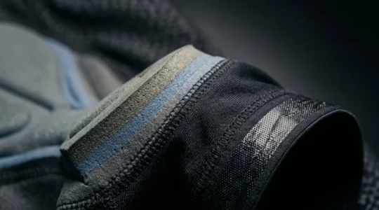 Close-up view of high-quality cycling bib shorts highlighting advanced chamois padding technology and compression fabric